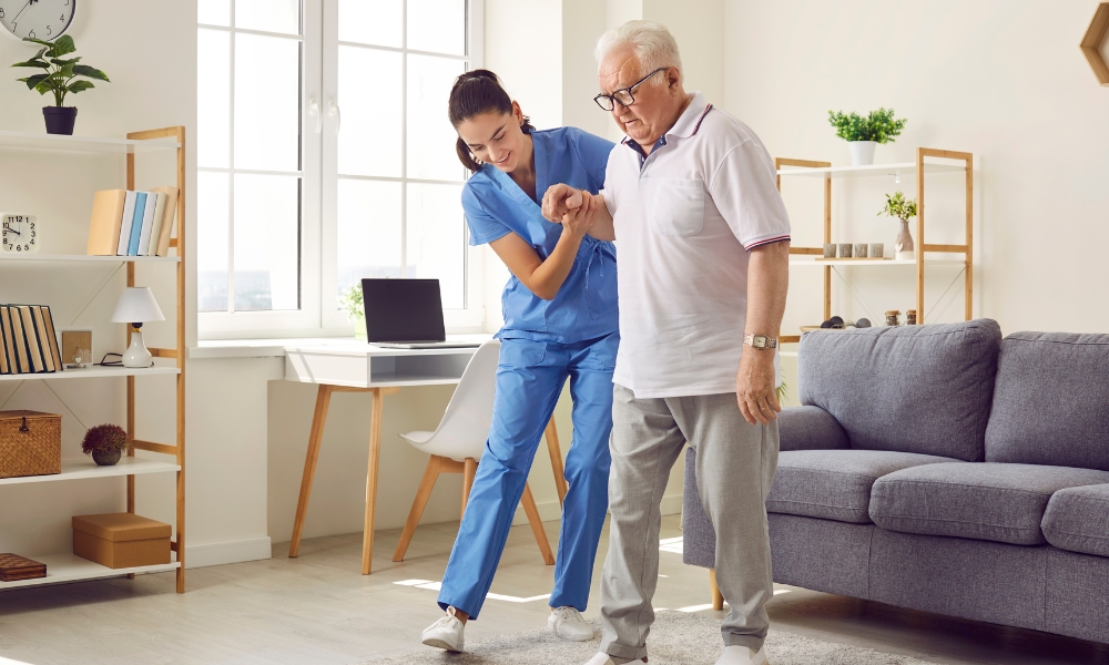 Stroke rehabilitation patient working with physical therapist on mobility and balance exercises