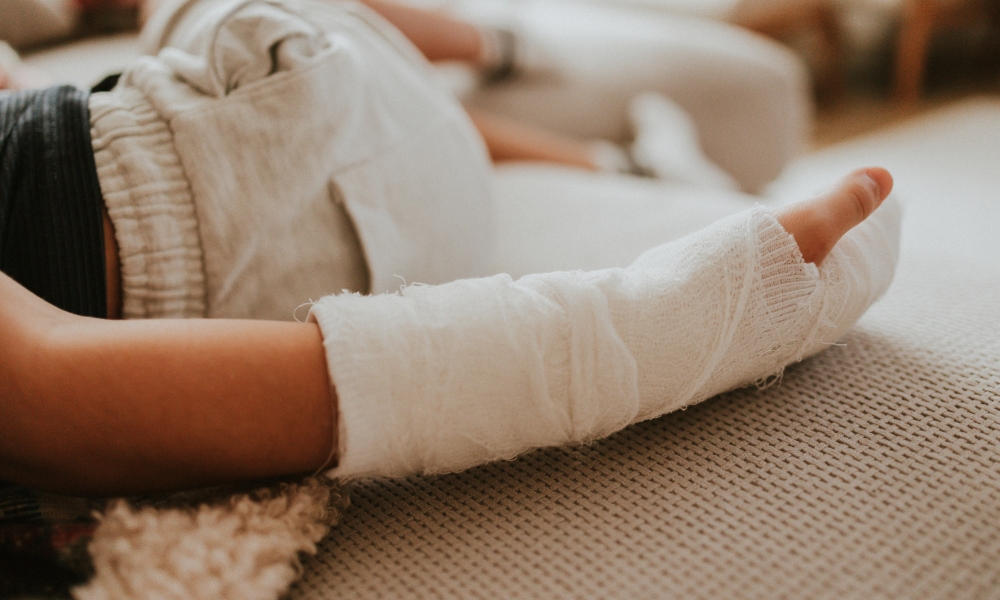 Patient performing physical therapy exercises after car accident injury recovery