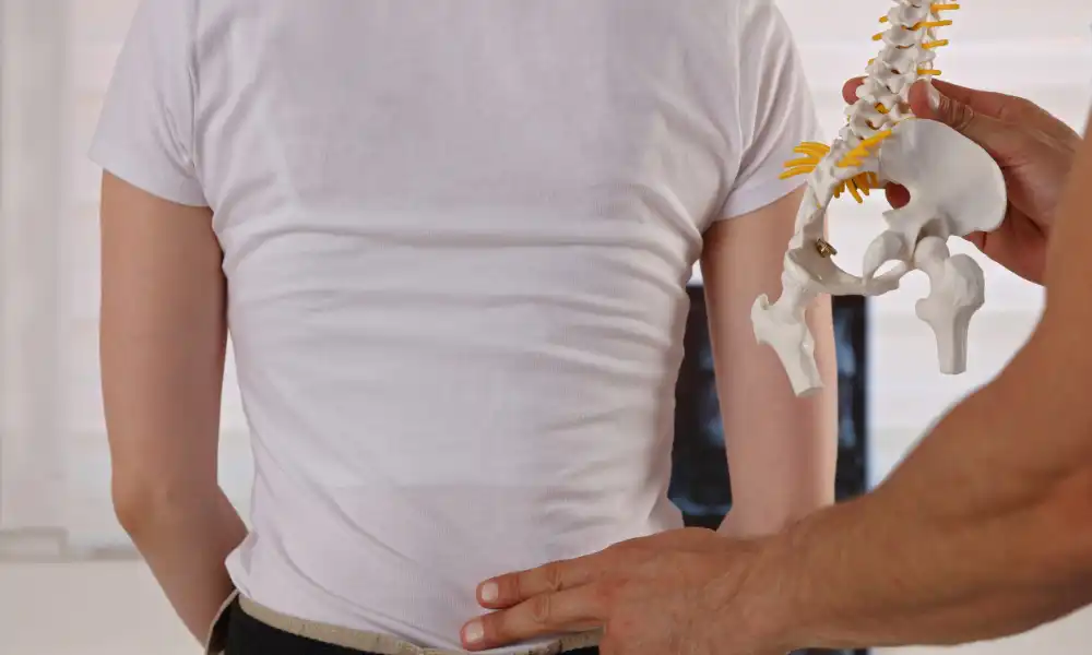 Physical therapist guiding patient through exercises for pinched nerve recovery and nerve pain relief
