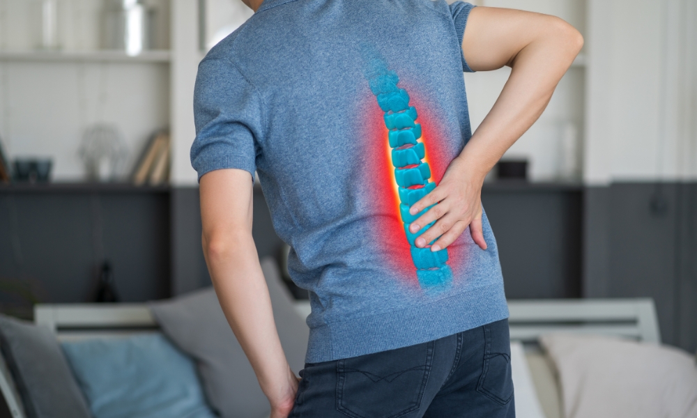 Sciatic nerve pain pathway illustration showing lower back and leg symptoms